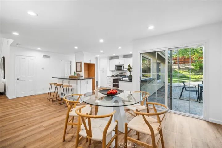 Enjoy another beautiful fireplace while sharing a meal in the dining room