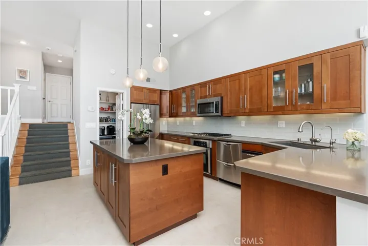 Beautiful lighting highlights oversized island
