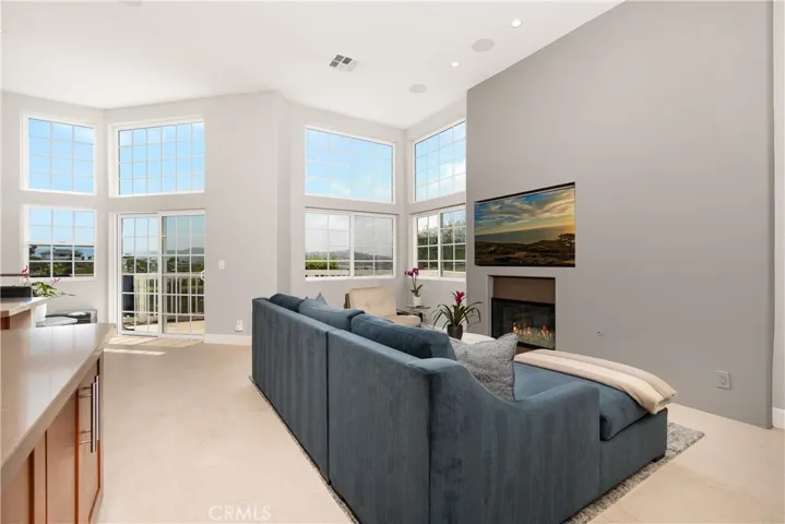 Large, paned windows overlook your lovely view