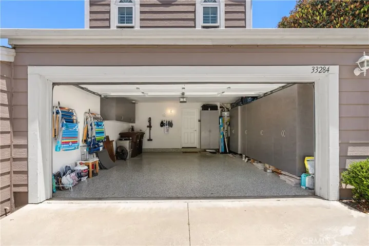 Garage with epoxy flooring and built-ins