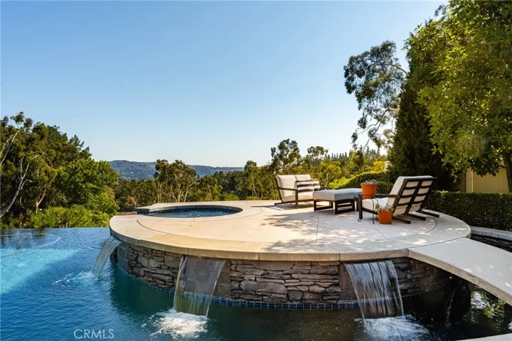 Imagine a glass of wine with friends up on the raised spa.