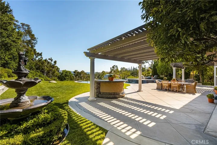 The outdoor kitchen has room for four or more stools for chatting with the Chef.