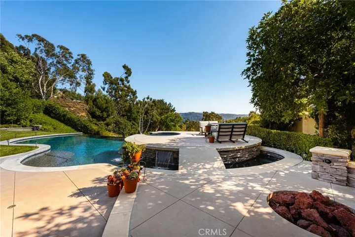 Step across the bridge to your raised spa.