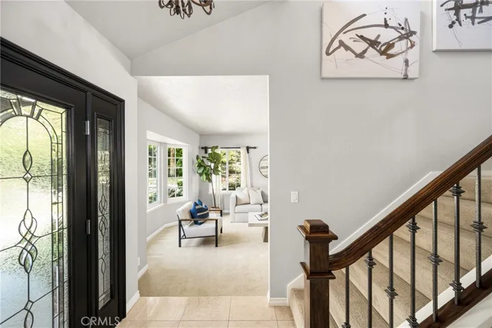Double leaded front doors welcome your guests. Step left into the formal living room. Step right into the great room and kitchen.