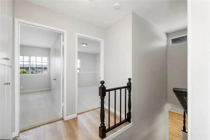 Hallway landing where you will be able to utilize the switch for the whole house fan that takes out the hot air from the attic/home.