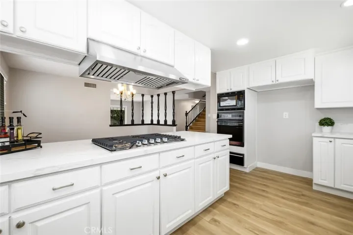 New hardware tooBring down the heat! Range hood vented exhaust fan to help keep in control.