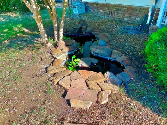 Small Pond next to front Entry