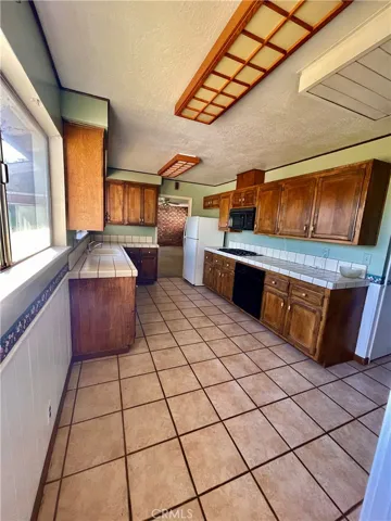 Kitchen, looking from Laundry Room