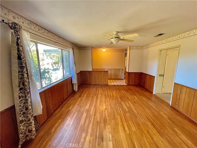 Front Living Room, looking towards Entryway + Hallway