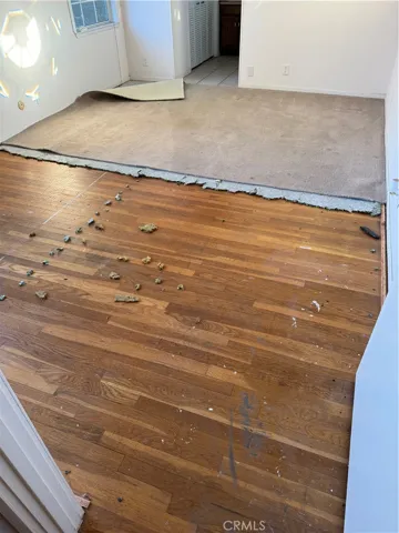 Primary Bedroom, from Hallway - Carpet remove to expose Oak Flooring