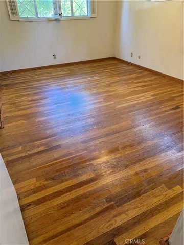 Front Bedroom w/ en-suite Bathroom - Carpet removed to expose Oak Floorinng!