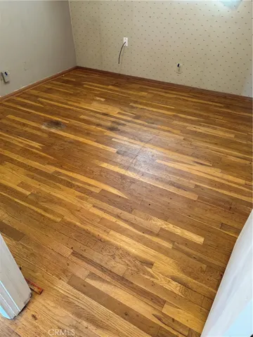 Front Bedroom/Office - Carpet removed to expose Oak Flooring!