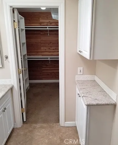 Cedar lined walk in closet in the master bathroom