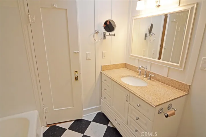 The secondary bathroom has a tub with a shower.  A skylight for ventilation and light, too.