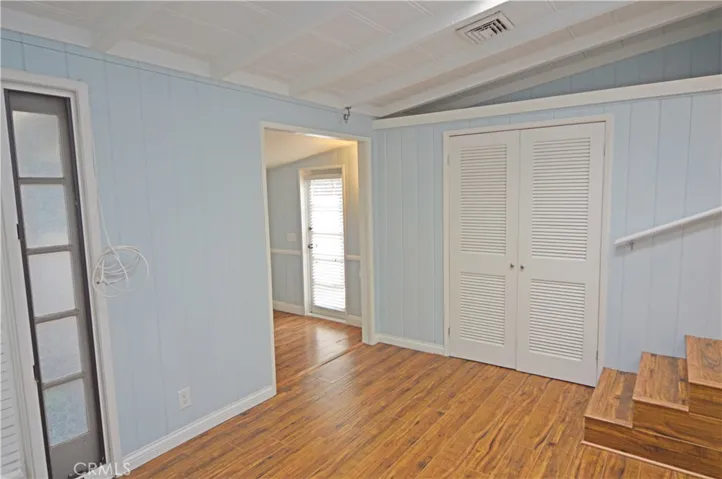 Two primary bedroom doors lead to the outside.