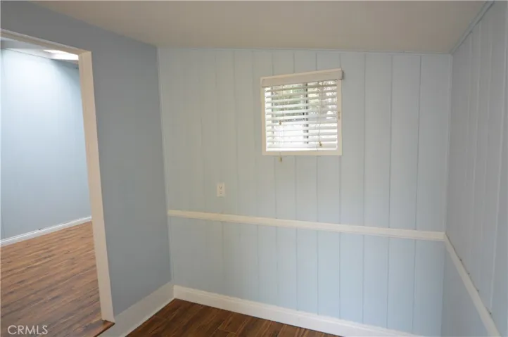 The alcove off the primary bedroom can be additional closet space or an office.