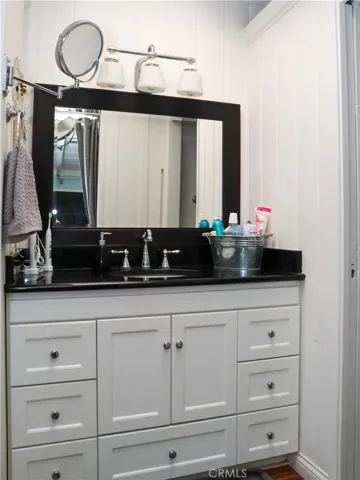 Primary bathroom's sink and vanity space.