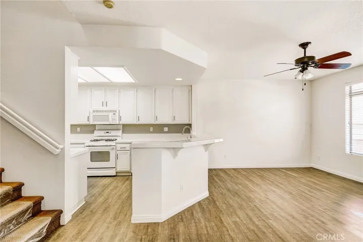 Open to dining area, stairway to 2nds story