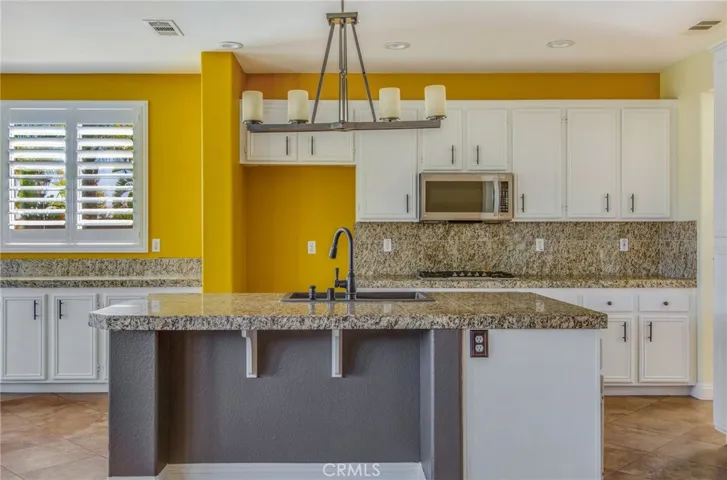 Another view of Kitchen, Island, Breakfast Bar from Family Room