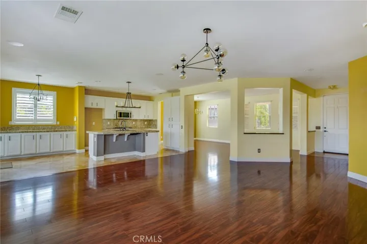 View of Kitchen, Island, Breakfast Bar from Family Room
