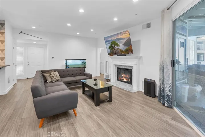 Entering this gorgeous home to a bright and open Living Room space