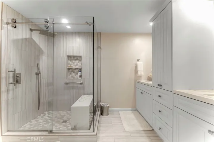 Primary ensuite bath seamless glass shower