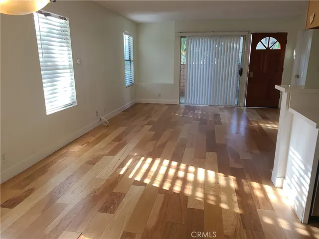 Light and bright family room with new 
 easy care flooring