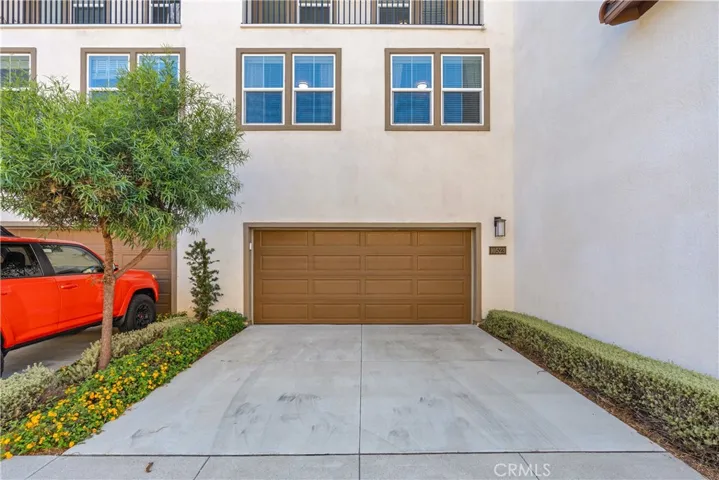 Two Car Attached Garage with Driveway