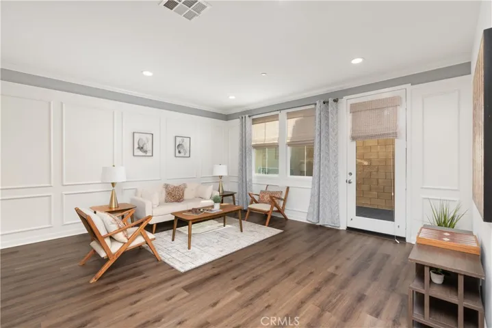 Living Room with Door to Backyard Patio