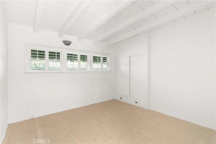 Light-filled third bedroom with reach-in closet