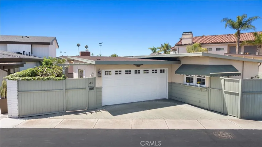 The private, gated Balboa Coves community offers total seaside luxury