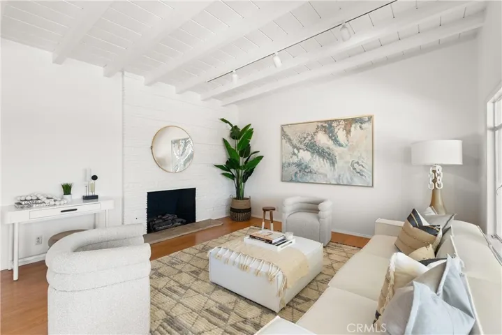 Exposed beam ceiling adds vintage architectural flair