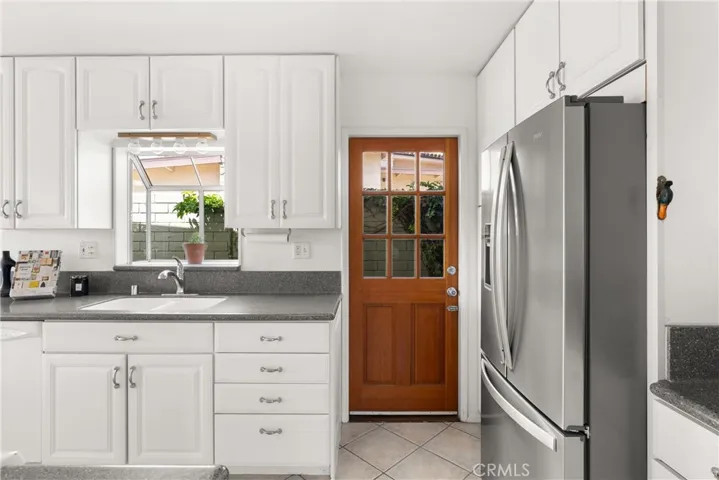 Stainless steel fridge and plenty of counterspace for all your cooking needs