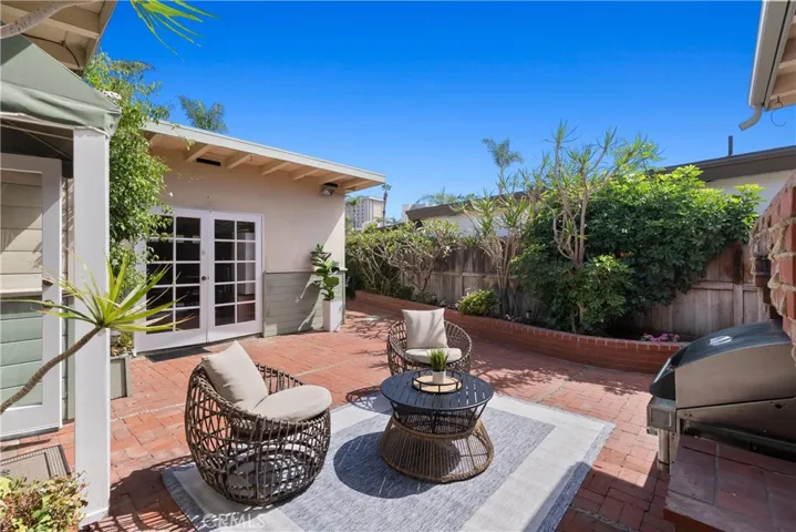 Enjoy the idyllic Newport Beach climate on the courtyard