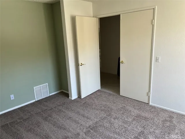 Bedroom with new carpet