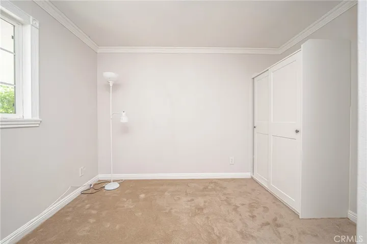 2nd bedroom with armoire closet