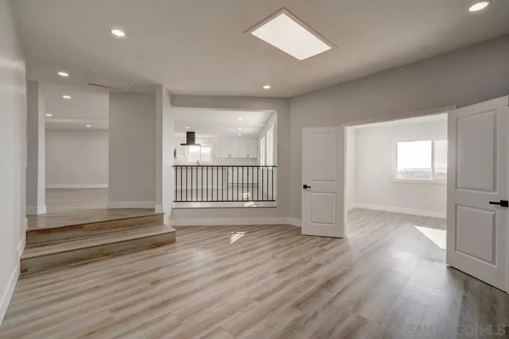FAMILY ROOM OPENS INTO KITCHEN