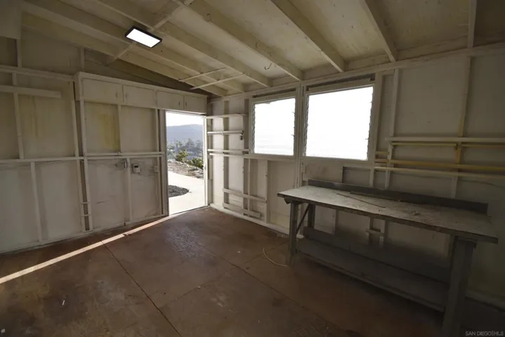 WORKSHOP CONNECTED TO BACK OF GARAGE