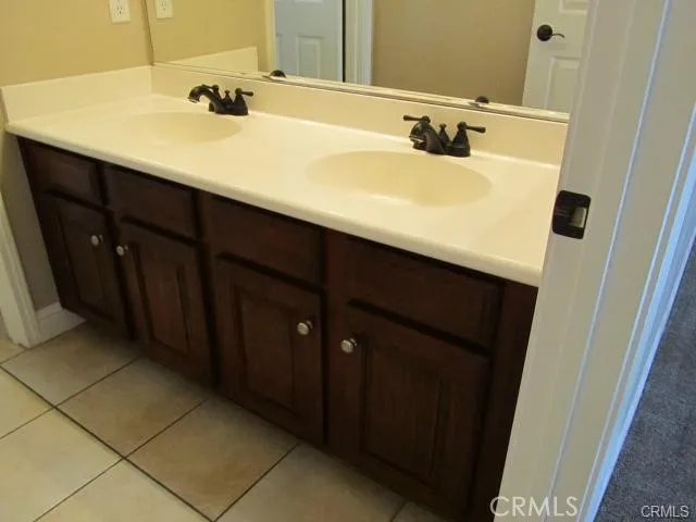 Upstair bathroom with double sinks.
