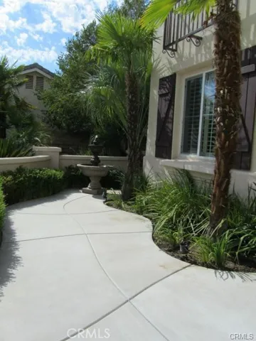 The porch area with a water fountain.