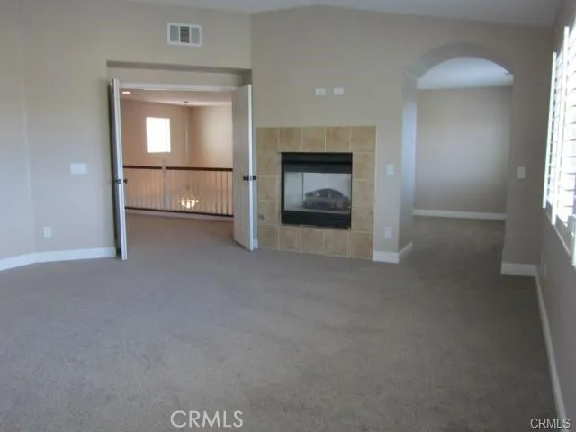 Primary Suite with a fireplace.