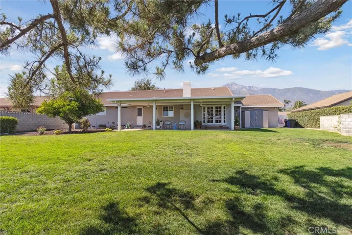 boasts an expansive 12,236 sq. ft. flat lot, perfect for enjoying stunning sunsets