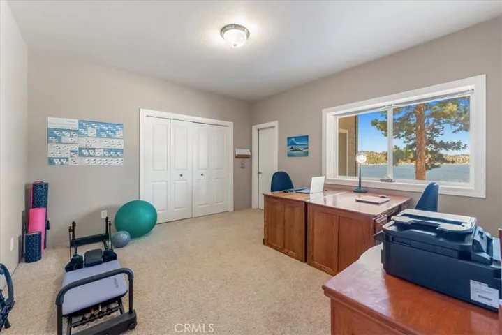 Lower level "Crews Quarters."  Currently used for home office and gym.