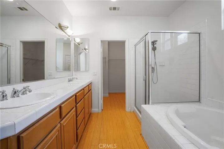 Primary Bath: Dual Sinks, Soaking Tub, Walk in Shower