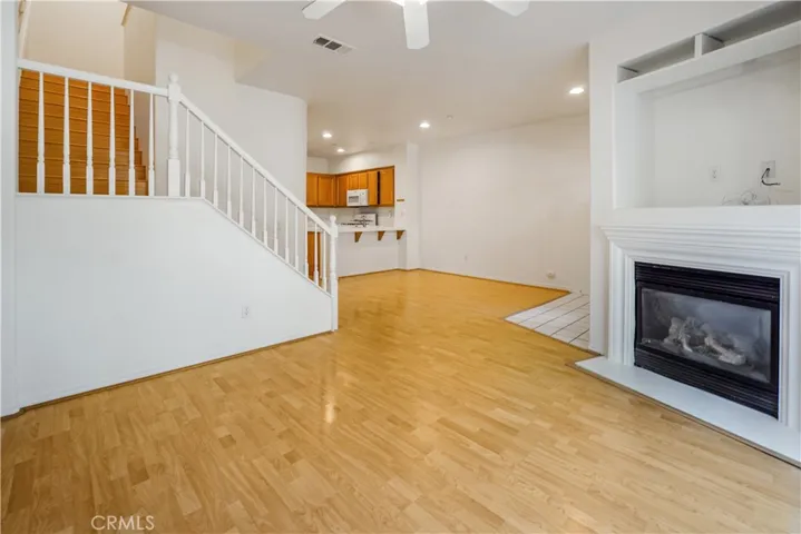 View from the Living Room into Formal Dining and Kitchen