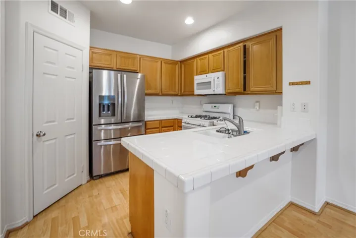 Huge Pantry  (Door next to the refrigerator)in this perfectly equipped Kitchen
