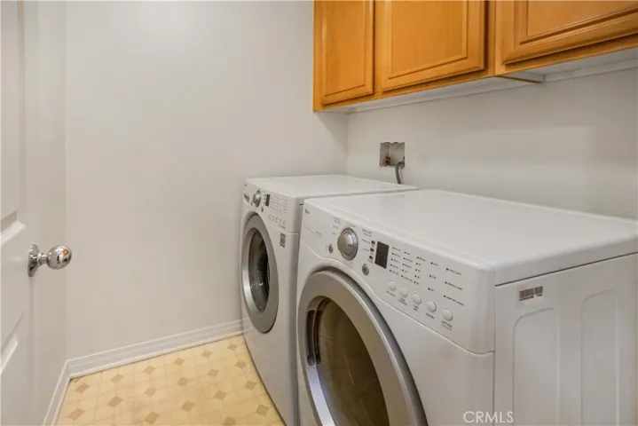 Separate Laundry Room include, additional storage as well as the Washer and Dryer
