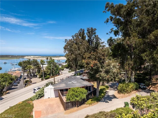 Address is on Main Street. Cypress is the street that circles the mature trees to create a feeling of privacy. Mail, trash and neighbors share this city street. Please park only in the designated areas.