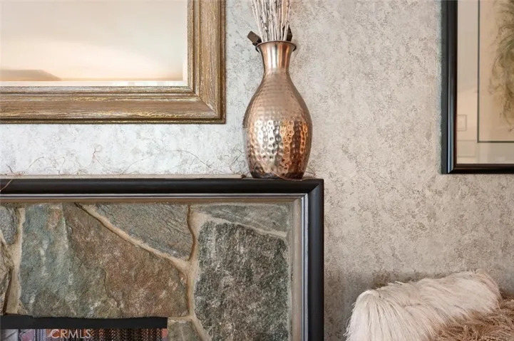 Mantle detail with black and silver mantle.