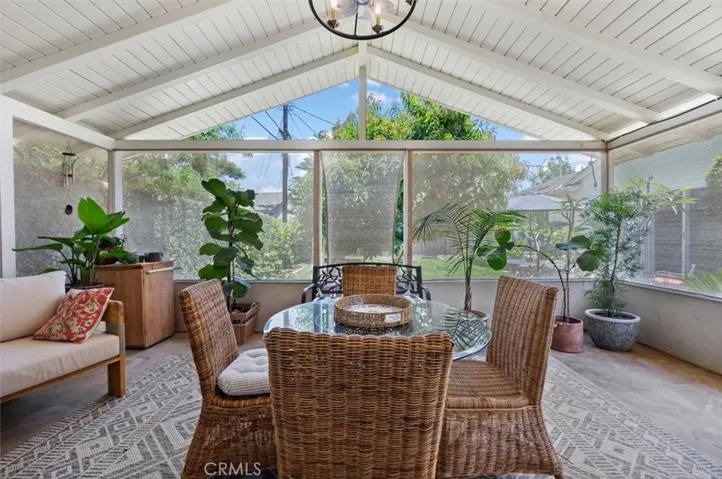 Open beam ceiling in covered patio.